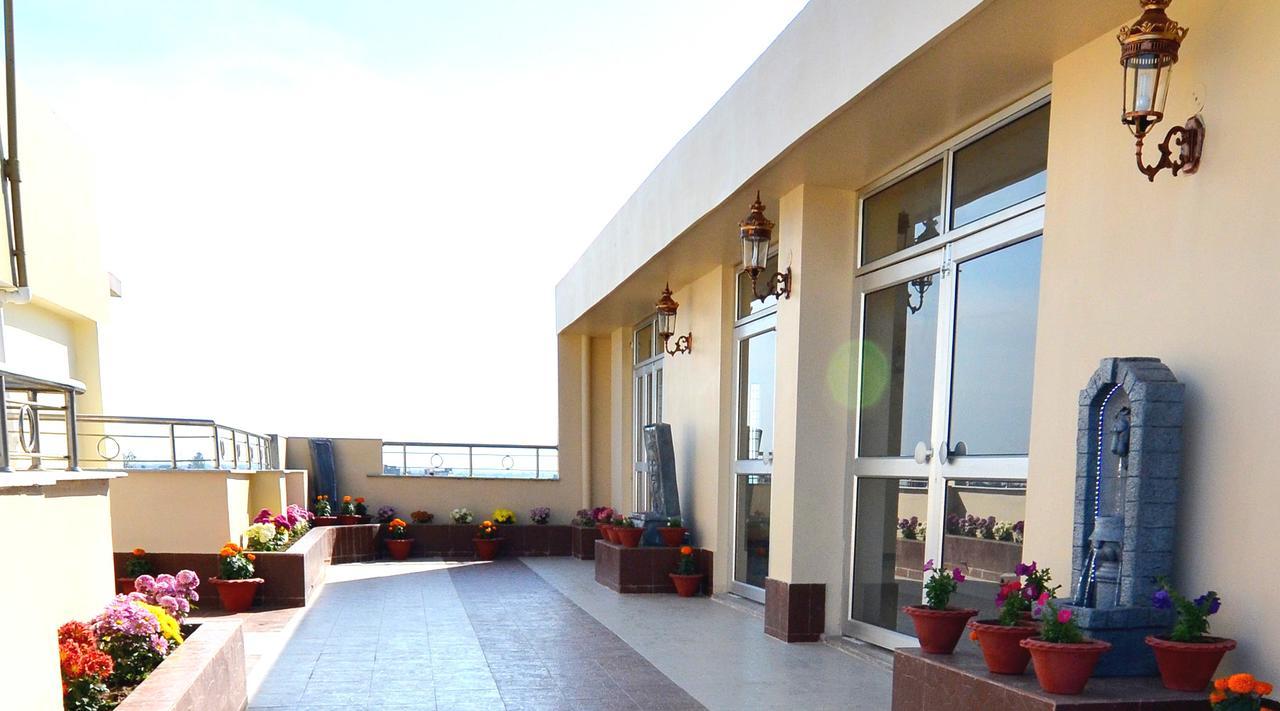 فندق Tulip Residency ديبروجاره المظهر الخارجي الصورة